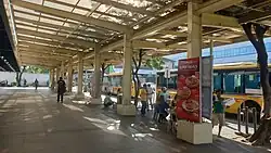Ayala bus stop, beside McKinley Exchange Corporate Center