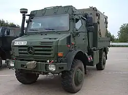 A Unimog U5000 of the German Army with an armoured cabin.