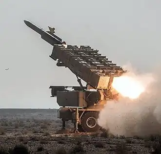 An Iranian military truck carries the new Kamin-2 air defense system on a military parade on Sep 2019