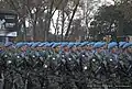 Soldiers in military uniforms.