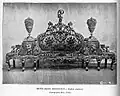 Confidante,[6] two-seater with triangular seats at either end, before 1897, rococo revival style, Portugal.