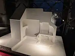 A model of a Romanesque church is seen.