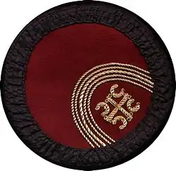 Montenegrin cap with the Serbian cross.