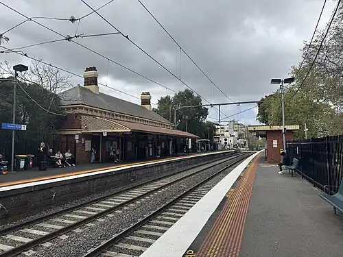 View from Platform 2, looking south, showing station buildings on both platforms