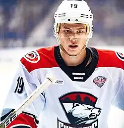 Ice hockey player wearing a Charlotte Checkers jersey