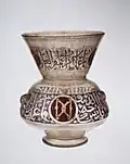 Mosque lamp; c. 1285; glass, enamels and gold; height: 26.4&nbsp;cm; Metropolitan Museum of Art[64]