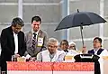 Muhammad Yunus signing the July Charter