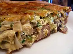 slice of quiche with light brown filling