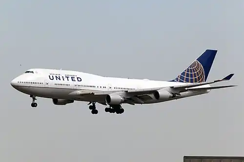 Post-merger Boeing 747-400 at Beijing Capital International Airport in ex-Continental "Golden Globe" livery (2010–2019)