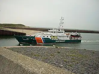 NL,Z-H,G._Den_Haag,Scheveningsehaven,Kustwacht_entering_the_port