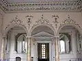 Arcade at top of stairs