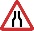 B14: Road narrows on both sides