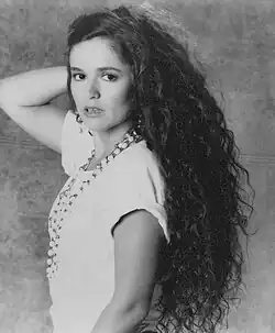 Larson (age 33; 1985)