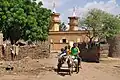 Mosque and donkey cart