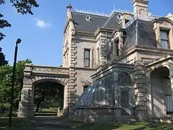 mansion with covered entry area