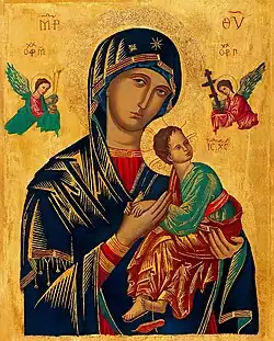 A traditional depiction of Mary, by Fra Angelico, wearing a blue mantle