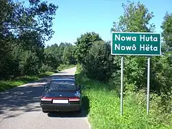 A bilingual Polish-Cashubian road sign for the village