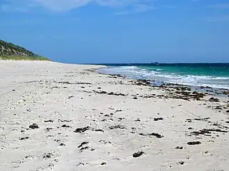 Looking south along Alkimos Beach towards wreck.