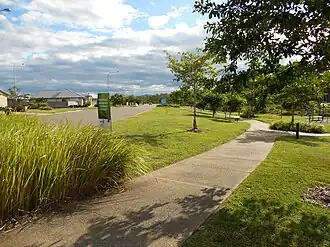 Modern housing development in Deeragun with a walkway along Saunders Creek