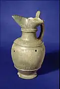 Oinochoe with gray body, with equine decorations 6th century. BC Tomb 48, Poggio Sommavilla Necropolis.