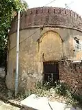 outer left pillar from the main entrance