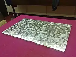 1,000 cubic centimeters of 99.9% pure platinum, worth about US$696,000 as of 29 Jun 2016 ($933,694 adjusted for inflation)[105]
