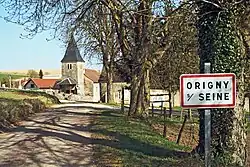 The church and surroundings in Origny