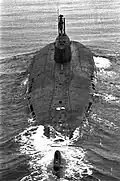 Project 949A (Oscar-II) underway. Pr. 949A boats had a different tail fin which accommodated the towed-array sonar (cylinder visible at the bottom of photo), an easy way to distinguish this class from its immediate predecessor