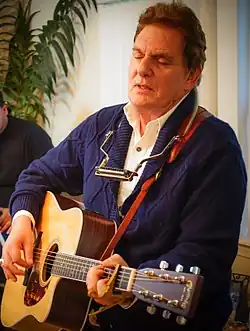 Sloan performing in 2014