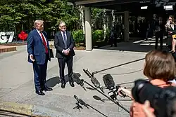 U.S. President Donald Trump and UK Prime Minister Keir Starmer present their signed trade deal at the 51st G7 summit. While the agreement cut section 232 tariffs such as those on automobiles, the 10% Liberation Day tariffs remained in place.