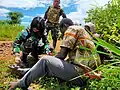 The Indonesian contingent of MONUSCO providing first aid to an injured civilian, 2020
