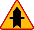 A-6a "intersection with side roads on both sides of the road" Drivers on the side roads have to yield [3]