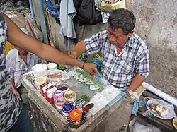 Betel quid vendor at Bogyoke Market in Yangon, Myanmar