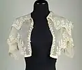 1830. Embroidered muslin pelerine, shown unfastened and unsupported