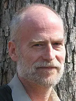 close-up of Peter Carruthers looking directly at camera