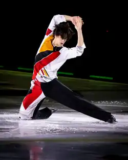Petr Gumennik performing on the ice in 2024