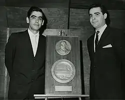 Amaury Veray (left) poses with fellow pianist Elías López Sobá