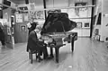 Piano painted by Corneille photographed at auction sale on Christies viewing day in 1987