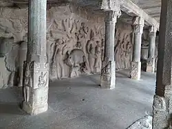 Pillars and bas-reliefs of people and animals