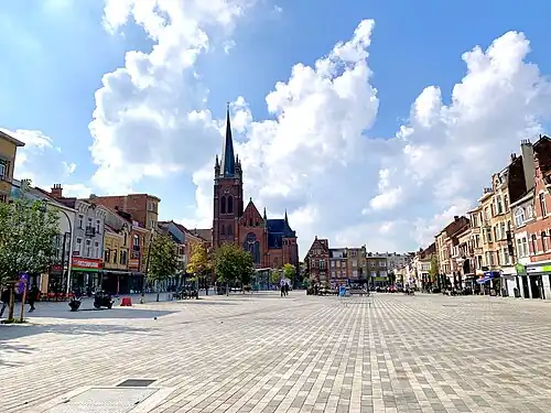 Place Reine Astrid/Koningin Astridplein and Church of St. Magdalene
