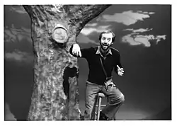 DeSpain telling stories under his signature tree on "Pleasant Journeys", his storytelling show for kids on KING-TV