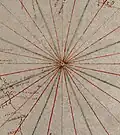 Early 32-wind compass rose, shown as a mere collection of color-coded rhumblines, from a Genoese nautical chart (c. 1325)