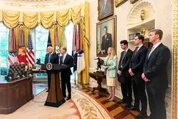 President Donald Trump and Paul Atkins at a swearing-in ceremony in the Oval Office.