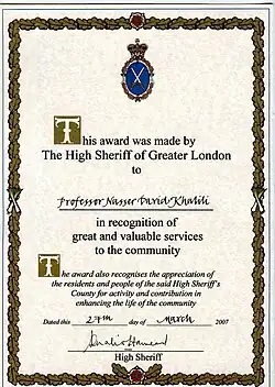 Decorative certificate reading "This award was made by The High Sheriff of Greater London to Professor Nasser Khalili in recognition of great and valuable services to the community. The award also recognises the appreciation of the residents and people of the said High Sheriff's County for activity and contribution in enhancing the life of the community. Dated this 27th day of March 2007 [signature] High Sheriff". The recipient's name and date are hand-written.