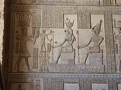 Ptolemy XII before Isis and Osiris, at the Hathor Temple, Dendera.[13][20]