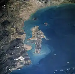 Qeshm Island is in the center of frame, the Clarence Straight is to its left.
