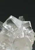 Calcite, butterfly twin, 4.0 × 3.3 × 1.6 cm. José María Patoni, San Juan del Río, Durango (Mexico)