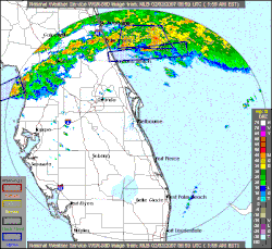 A long east–west line of various colors indicates the strength of the storm as it moves across the Floridian peninsula. Boxes indicate the warnings issued by the Nation Weather Service. A particularly violent section of the storm, the part which caused the tornadoes, is signified by deep red. It is followed across the state by NWS warnings.