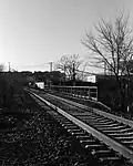 A railway bridge on the western approach to Wulu Railway Station, photographed in December 2024. Photo was taken on Kentmere 400 black and white film.