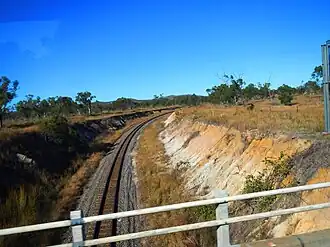 Flinders Highway crossing the Great Northern (Mount Isa) railway line, 2013